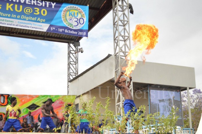 Sarakasi dancers entertaining the audience at the KU@30 ceremony.